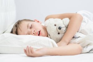 Boy breathing in his sleep